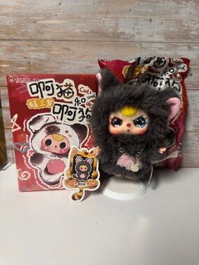 Baby three cats and dogs, black forest with special eyes